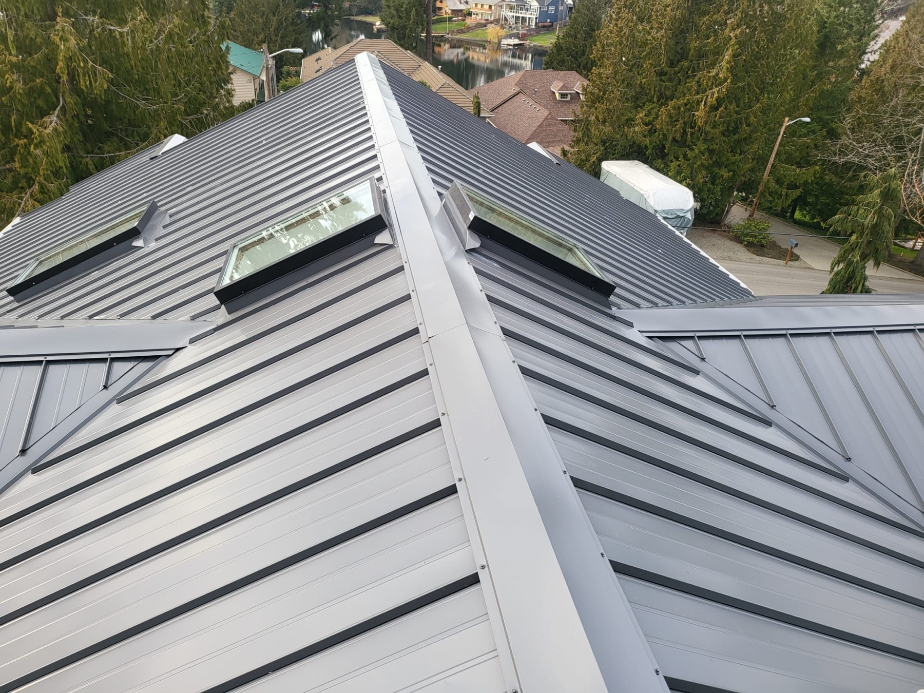Standing-seam metal roof with skylights